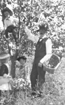 Crawford family in orchard